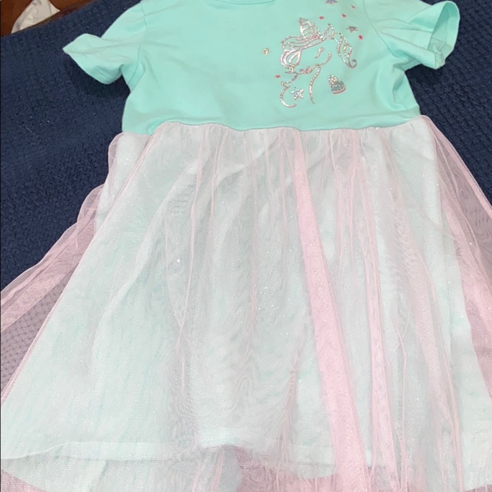 2 girls unicorn dresses, sparkly tulle at bottom